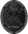 IAN wound badge black.png