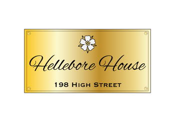 Nameplate for Hellebore House. This gold plated plaque was a gift from the His Grace, the Duke of Mountain View and his wife, the Countess of New Essex, and adorns the home's perimeter wall to the right of the main gate.